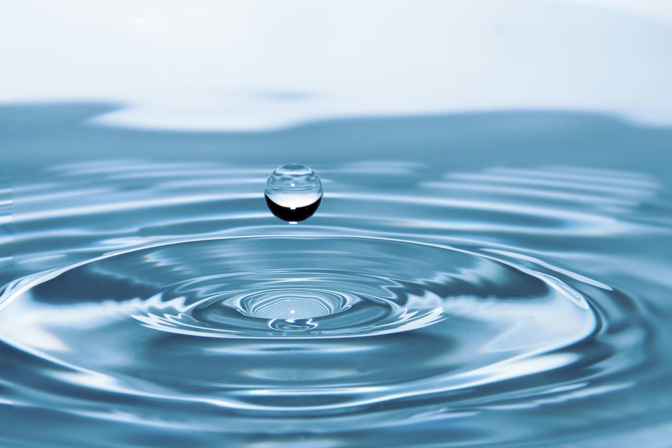 Water ripple with droplet