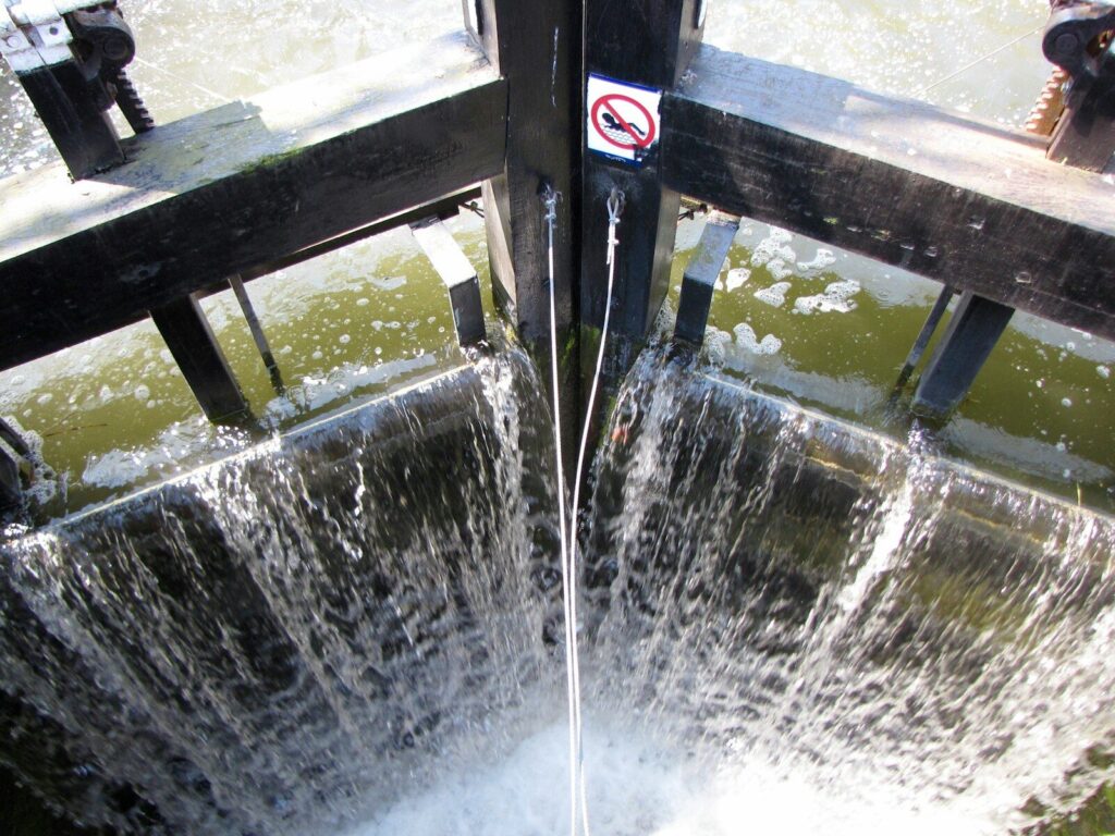 Water flowing through a canal lock gate