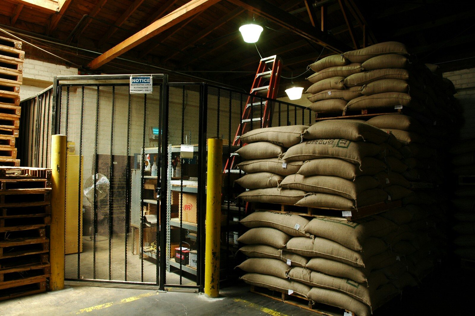 a warehouse filled with lots of bags of sand